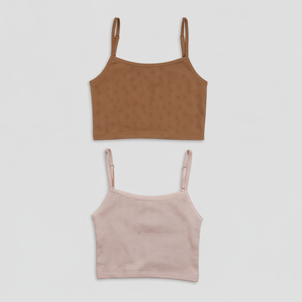 Two crop tops, one brown and one pink, on a light gray background.